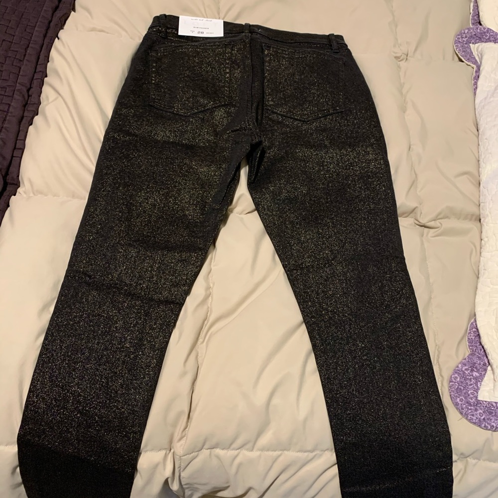 Black/gold LOFT skinny jeans